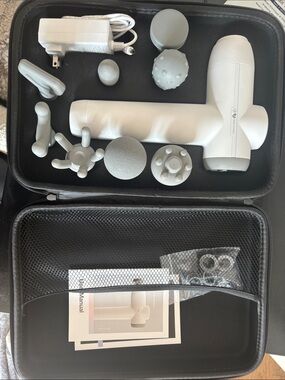Aura White Percussion Massage Gun with warming Interchangeable Heads